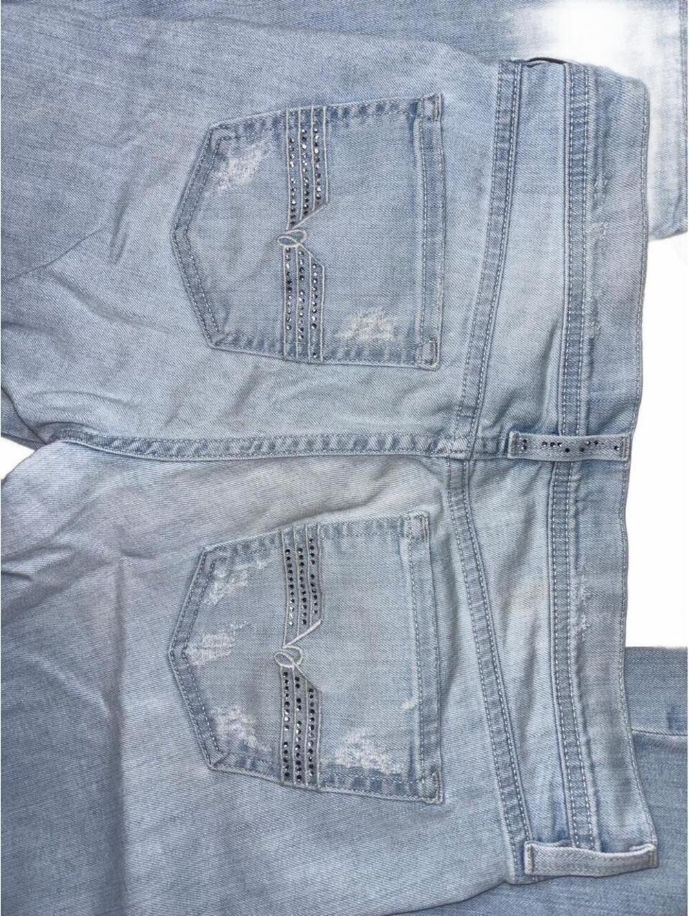 Y2K Bebe light wash flare jeans with a distressed look & Rhinestone design.